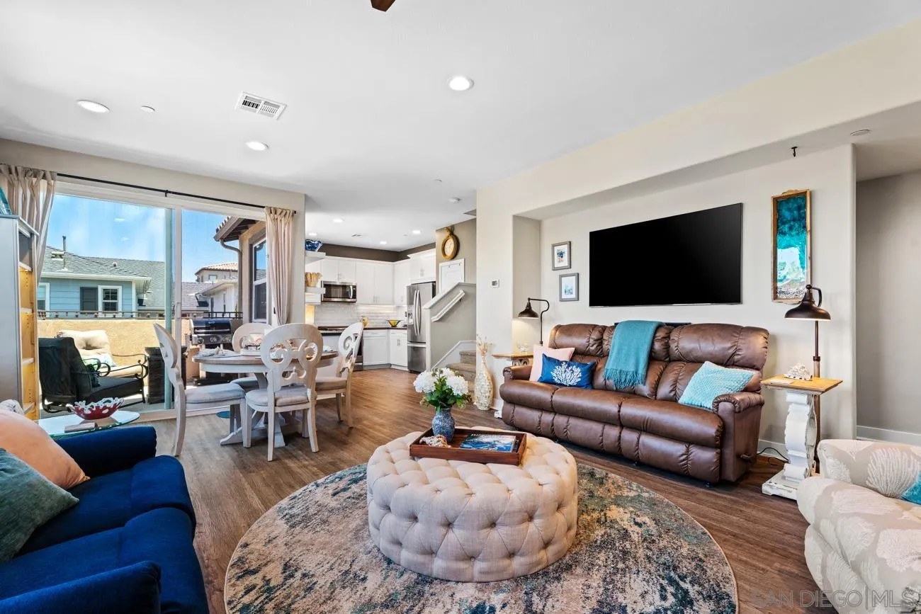 4326 Star Path Way, Unit 1 Oceanside, CA 92056 - Photo 12 of 46 a living room with furniture and a flat screen tv