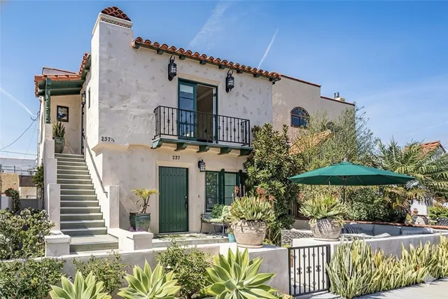 front view of a house with a small yard