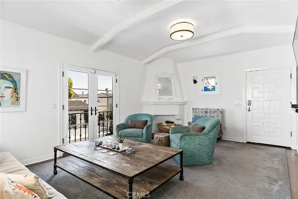 a living room with furniture and window