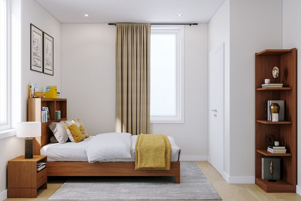 25 Adams Circle, Unit A Devens, MA 01434 - Photo 15 of 22 a bedroom with a bed and cabinets