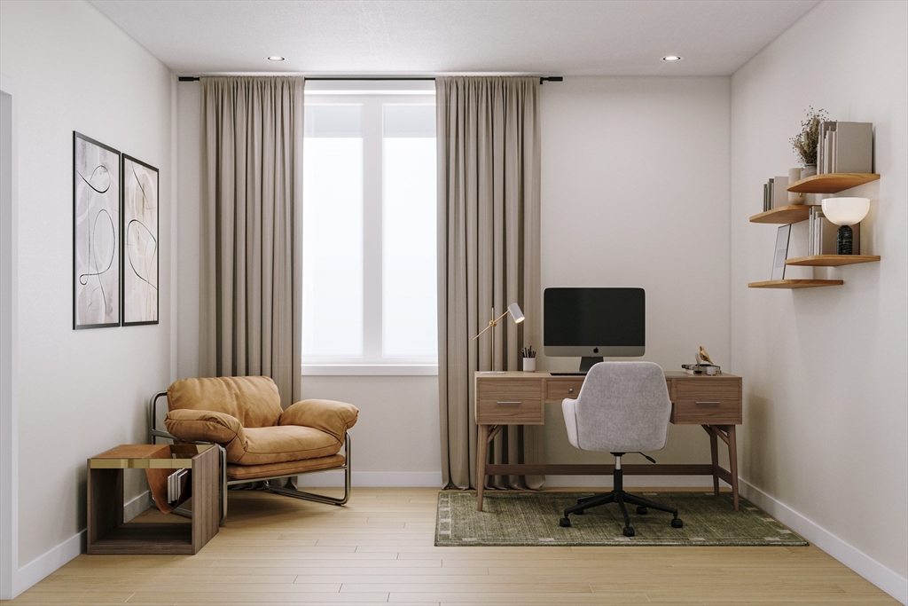 25 Adams Circle, Unit A Devens, MA 01434 - Photo 20 of 22 a work room with furniture and windows