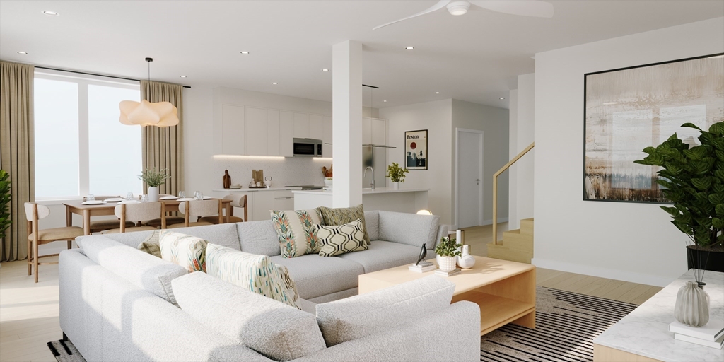 25 Adams Circle, Unit A Devens, MA 01434 - Photo 8 of 22 a living room with furniture and a large window