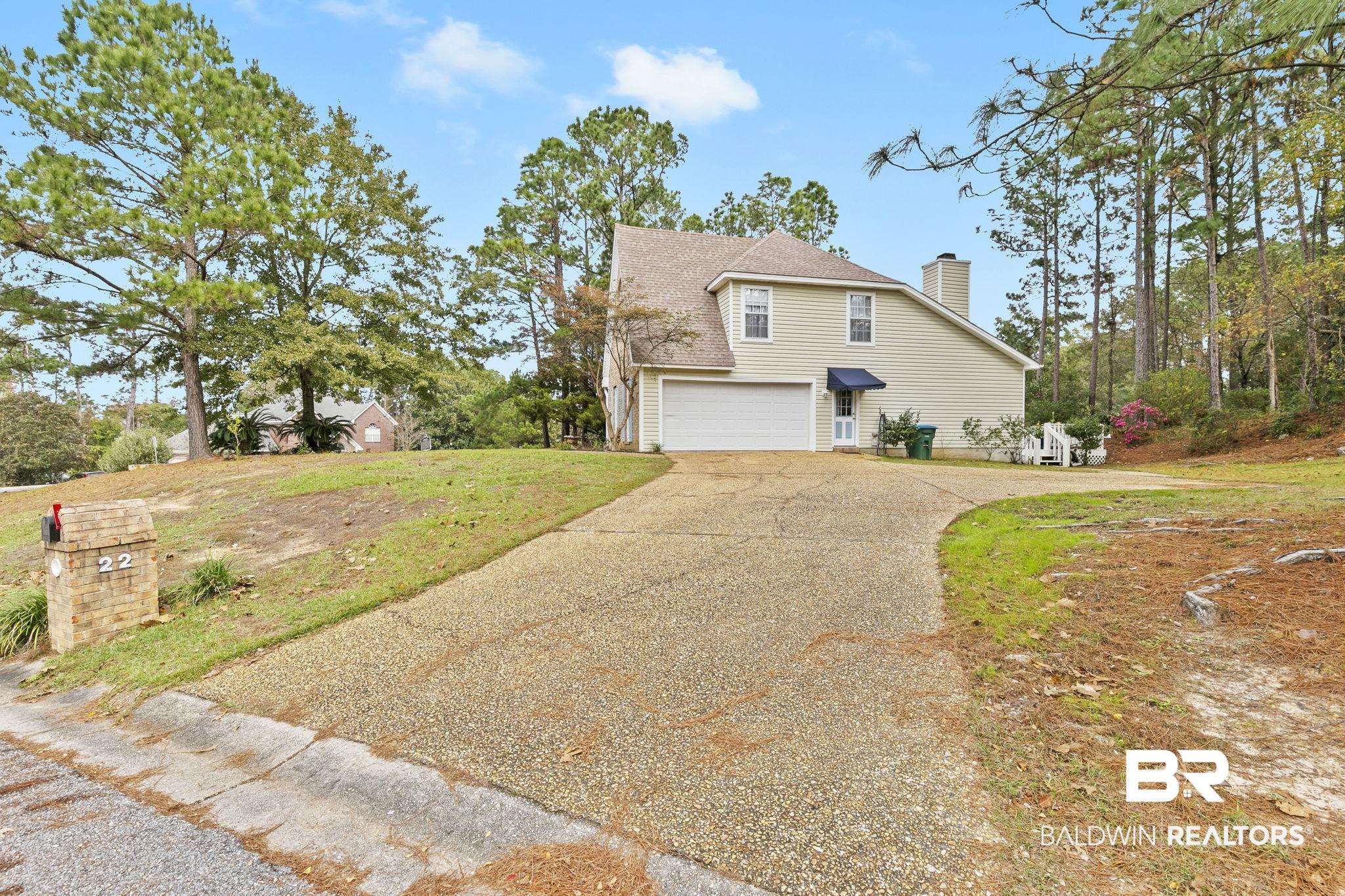 22 Pirates Lane Daphne, AL 36527 - Photo 35 of 36 View of front of property with a garage and a front lawn