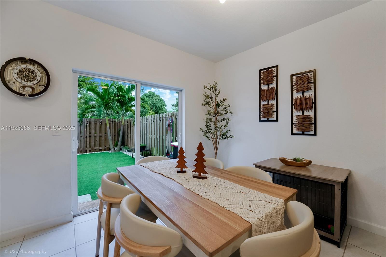 12453 Northwest 23rd Court Miami, FL 33167 - Photo 4 of 15 a living room with furniture and a window