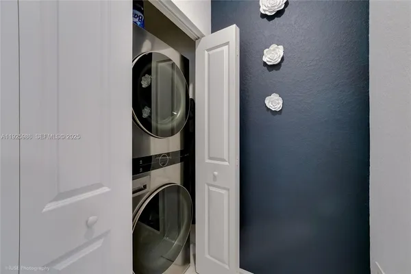 a utility room with dryer and washer