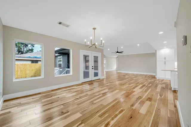 a view of an empty room and window