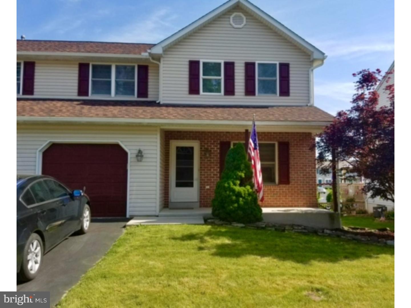 211 Bainbridge Circle Sinking Spring, PA 19608 - Photo 1 of 1 a view of a house with a yard plants and a large tree