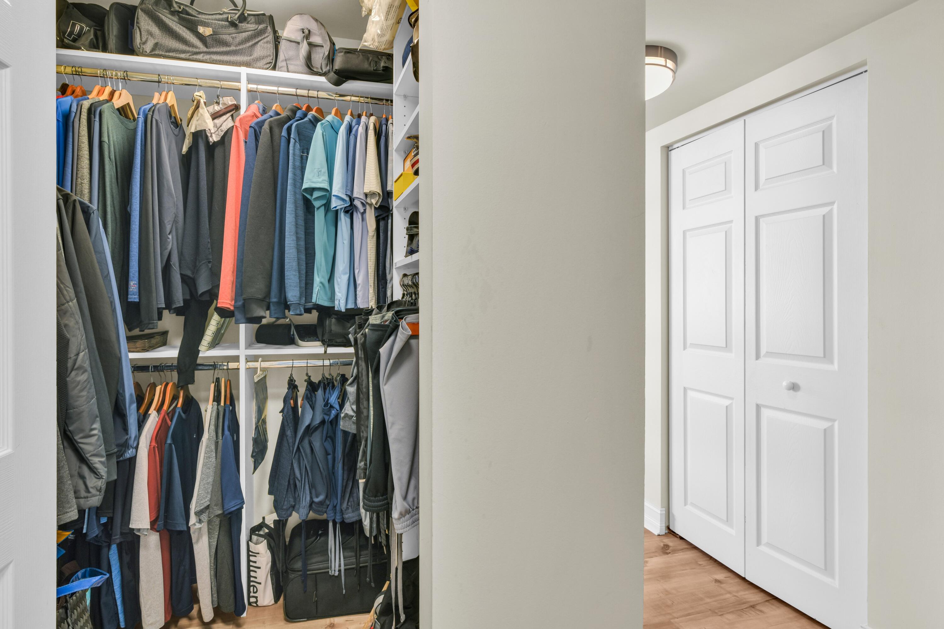 99 Southeast Mizner Boulevard, Unit 848 Boca Raton, FL 33432 - Photo 14 of 22 a view of walk in closet with clothes