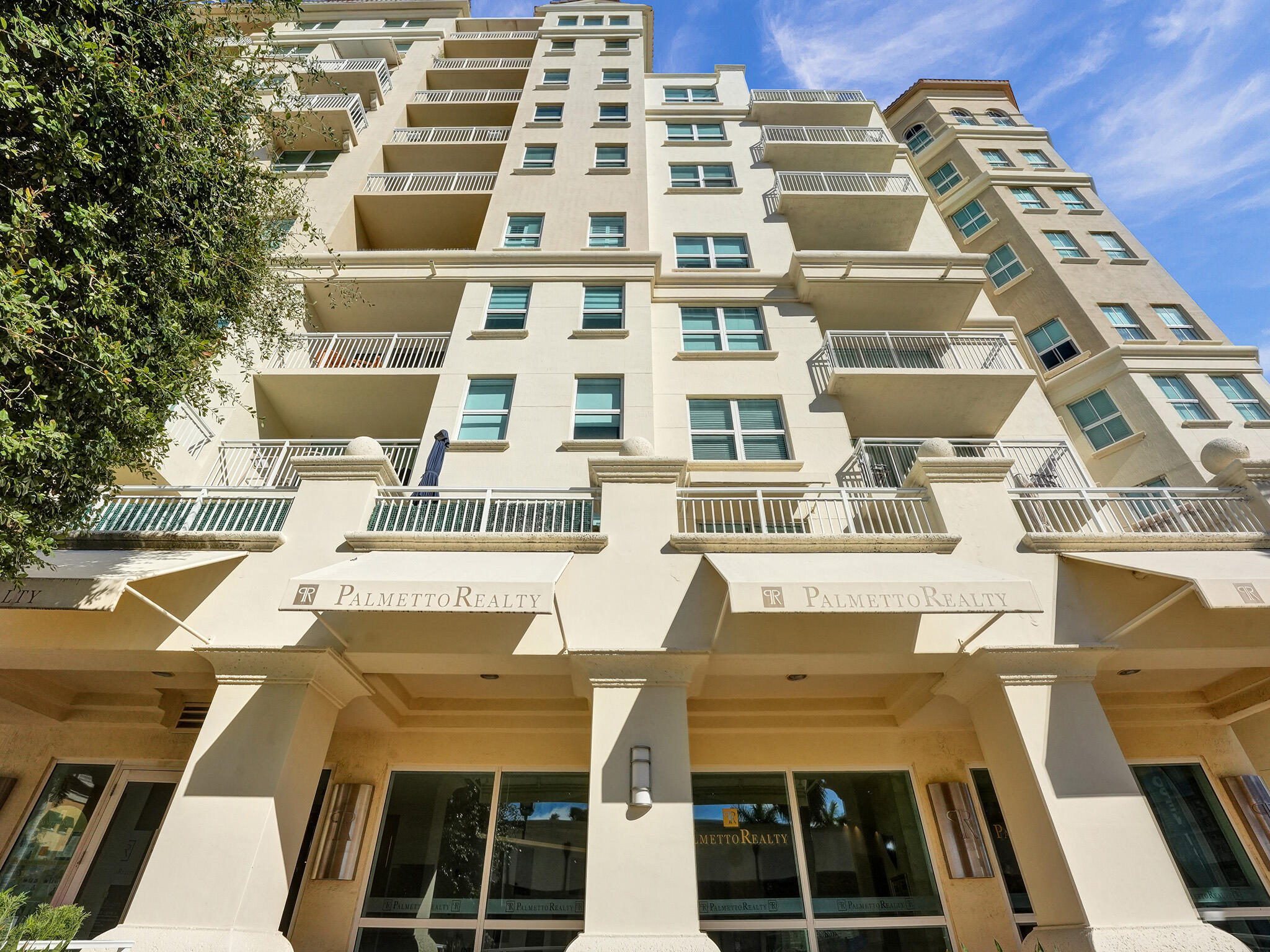 99 Southeast Mizner Boulevard, Unit 848 Boca Raton, FL 33432 - Photo 2 of 22 a view of a building with a outdoor space