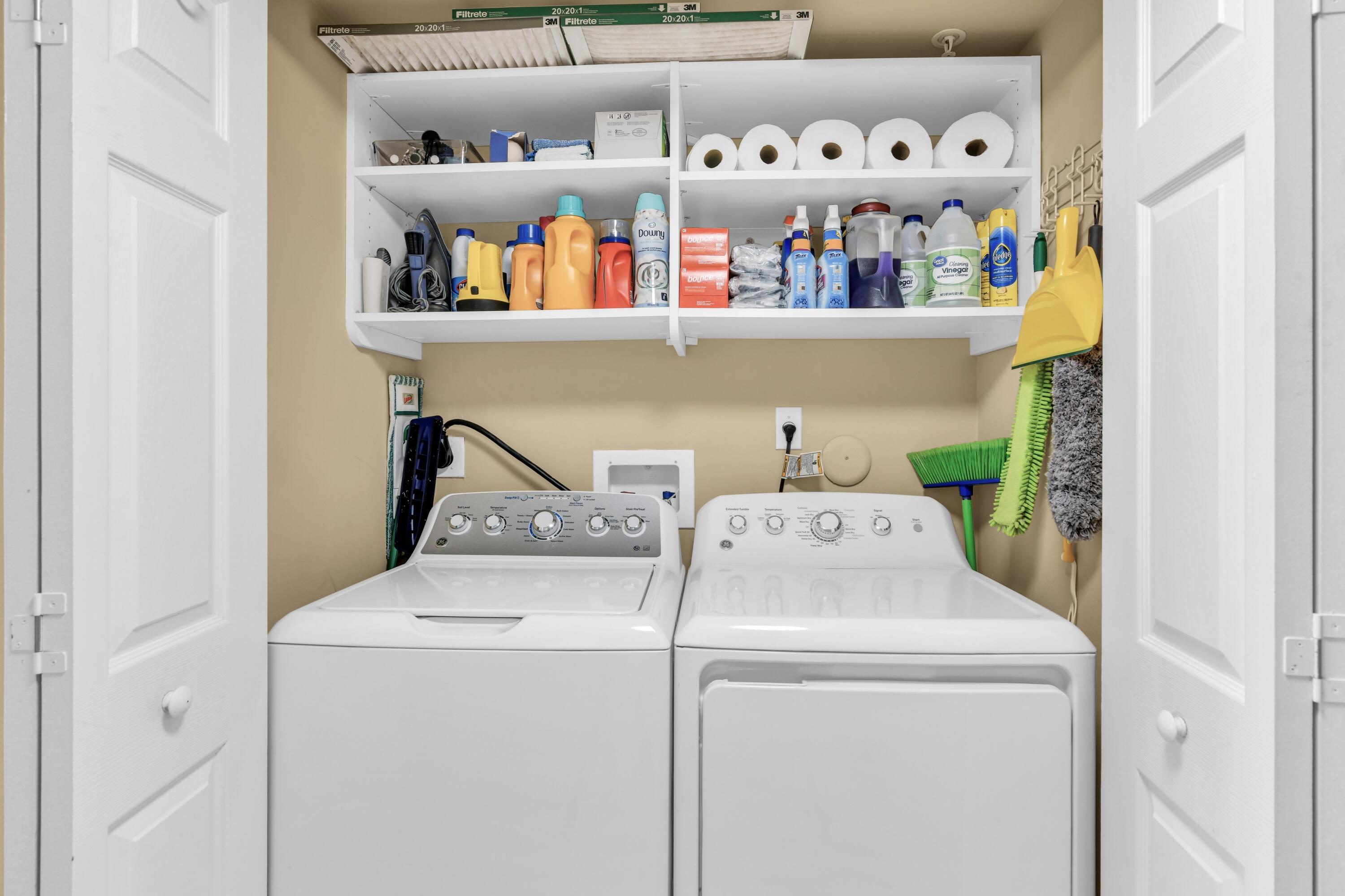 99 Southeast Mizner Boulevard, Unit 848 Boca Raton, FL 33432 - Photo 21 of 22 a utility room with dryer and washer