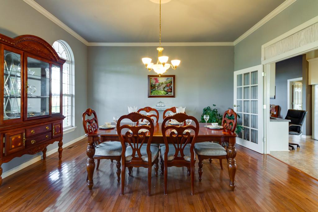3960 Armstrong Road Springfield, TN 37172 - Photo 7 of 30 a view of a dining room with furniture window and wooden floor