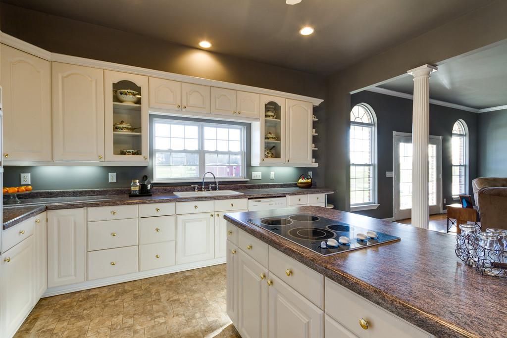 3960 Armstrong Road Springfield, TN 37172 - Photo 8 of 30 a kitchen with sink stove and cabinets