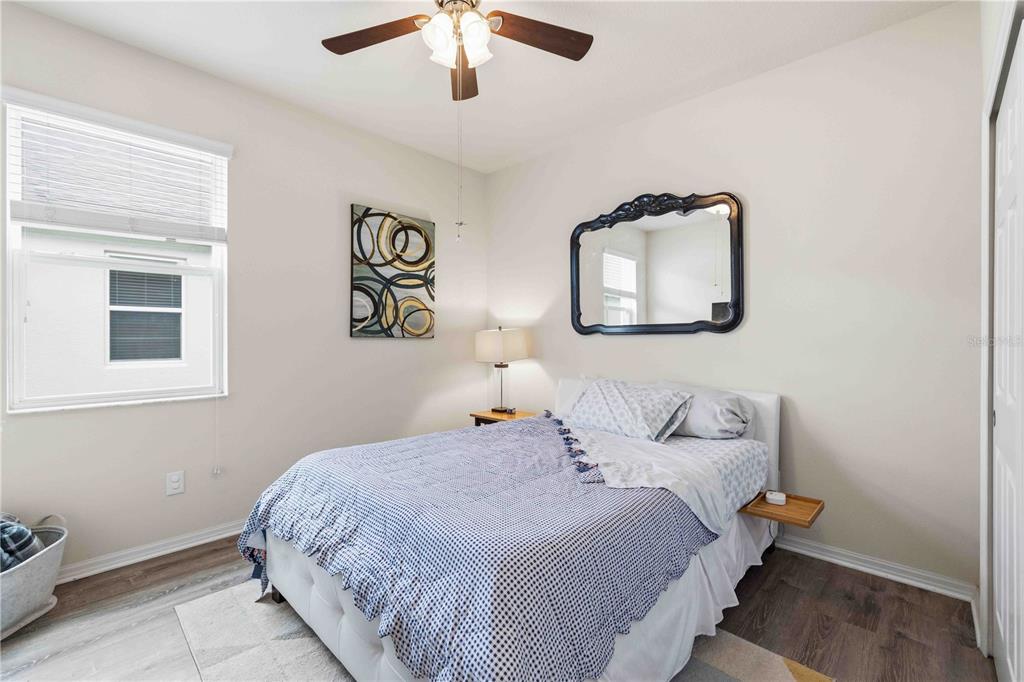 10920 79th Street East Parrish, FL 34219 - Photo 24 of 73 a bedroom with a bed and a window