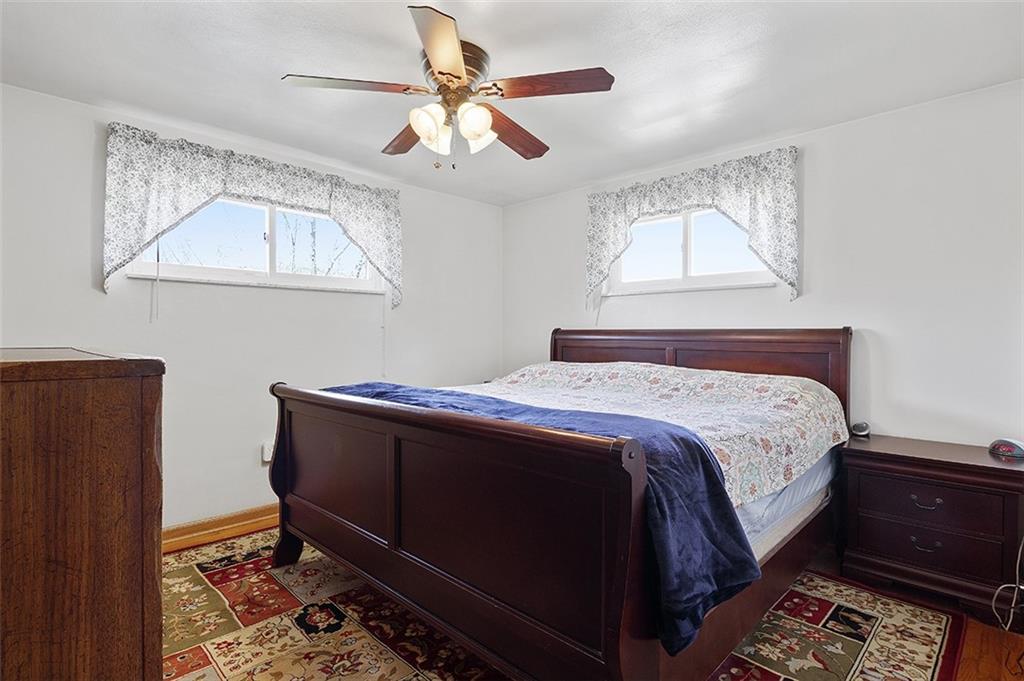 37 Coppola Road Cecil, PA 15321 - Photo 18 of 25 a bed sitting in a bedroom next to a window