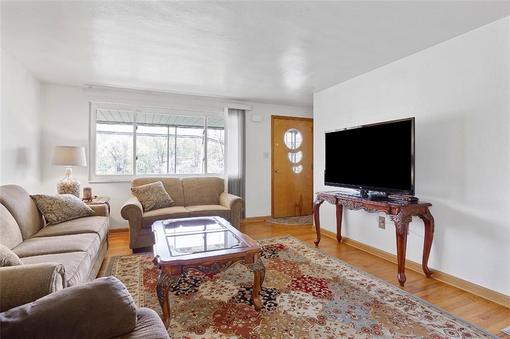 37 Coppola Road Cecil, PA 15321 - Photo 5 of 25 a living room with furniture and a flat screen tv