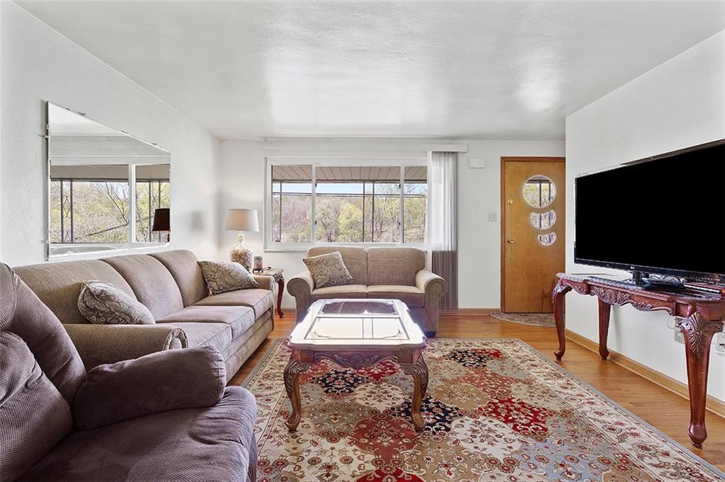 37 Coppola Road Cecil, PA 15321 - Photo 6 of 25 a living room with furniture and a flat screen tv