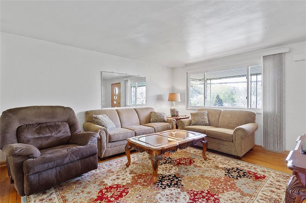 37 Coppola Road Cecil, PA 15321 - Photo 7 of 25 a living room with furniture a couch and two windows