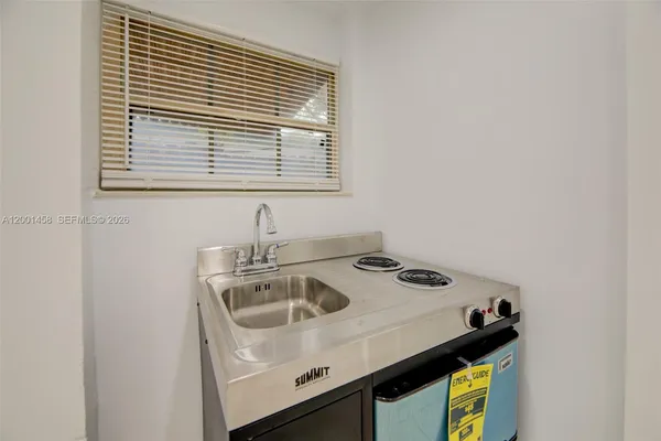 a view of an empty room and window