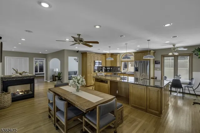 a kitchen with a table and chairs in it