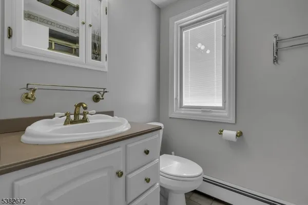 a bathroom with a sink and a toilet