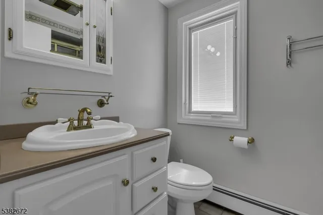 a bathroom with a sink and a toilet