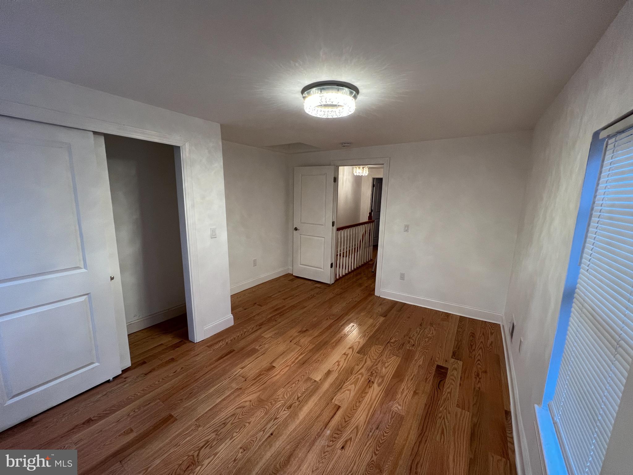 220 Lakeview Avenue Haddonfield, NJ 08033 - Photo 7 of 11 a view of empty room with wooden floor