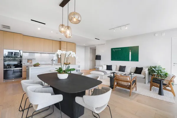 a view of a dining room with furniture