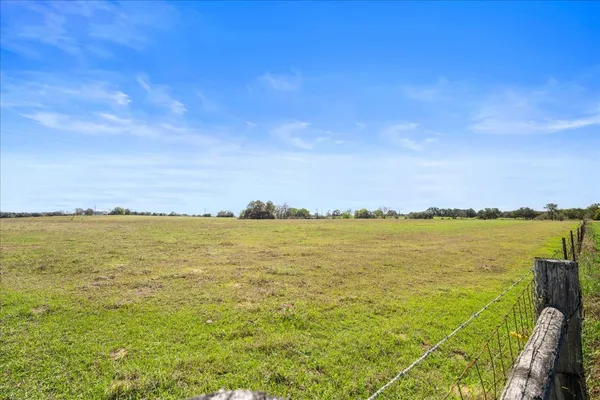 a view of an ocean from a mountain