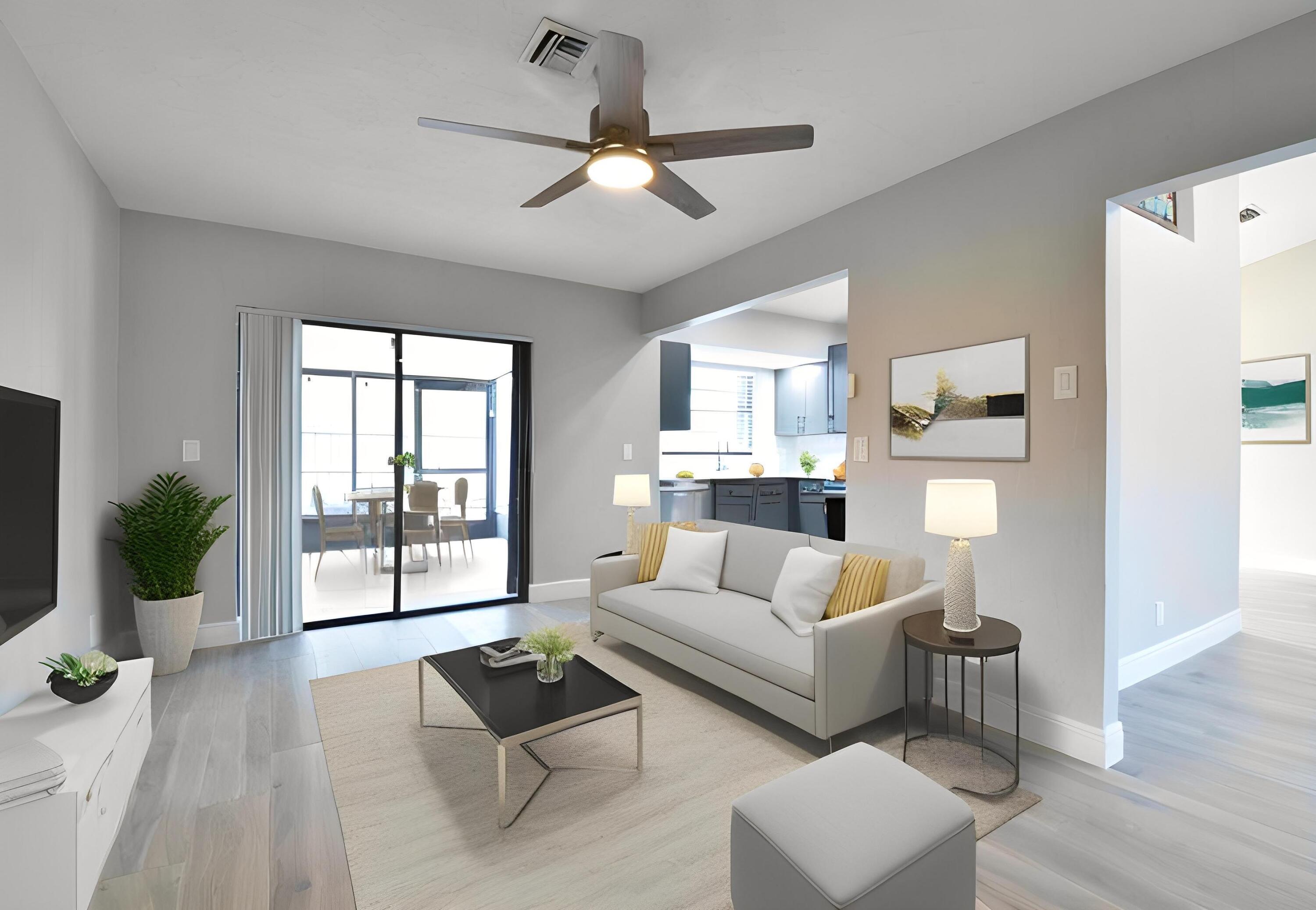 9425 Longmeadow Circle Boynton Beach, FL 33436 - Photo 14 of 34 a living room with furniture and a wooden floor