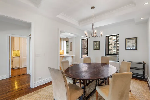 a kitchen with a stove a sink and a refrigerator