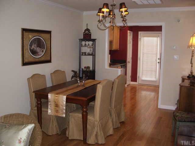 9814 Layla Avenue Raleigh, NC 27617 - Photo 5 of 7 a dining room with furniture and window