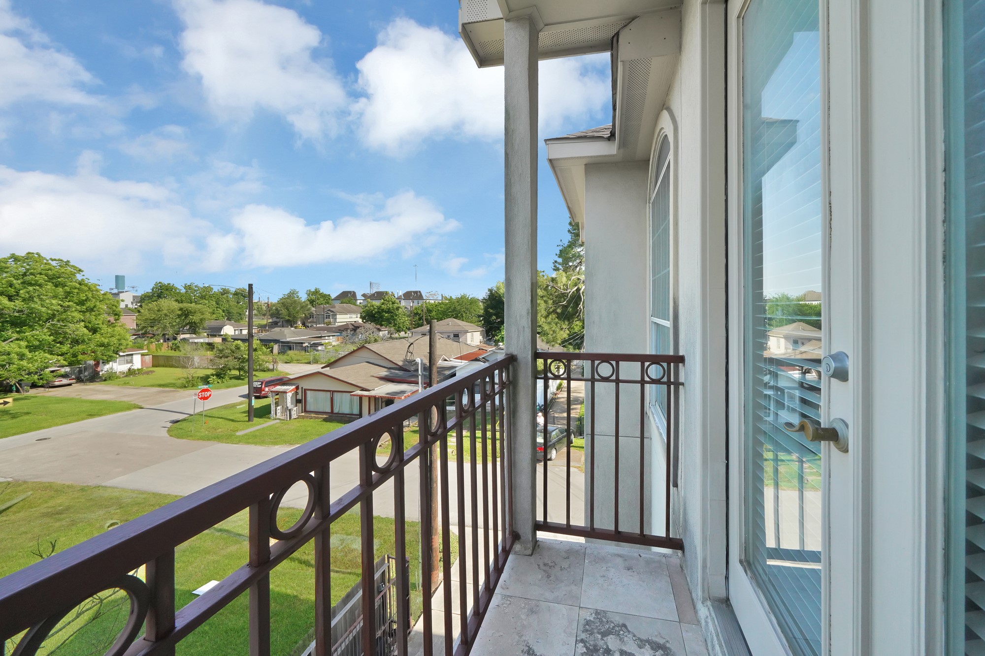 5206 Petty Street Houston, TX 77007 - Photo 17 of 26 a view of a balcony with an ocean view