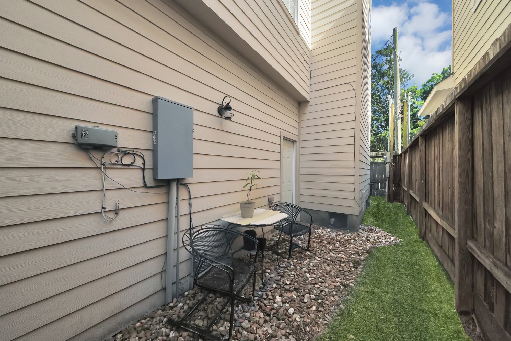 5206 Petty Street Houston, TX 77007 - Photo 19 of 26 a view of a chair and table in backyard of the house