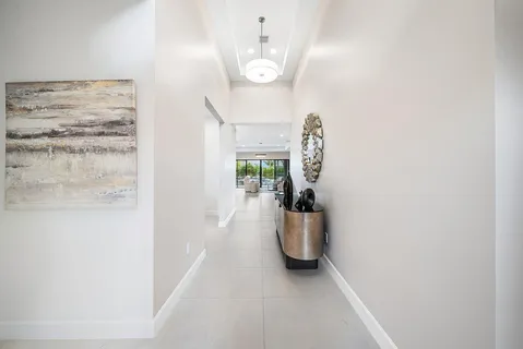a view of entryway and kitchen