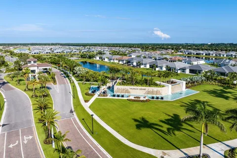 a view of a swimming pool with a garden