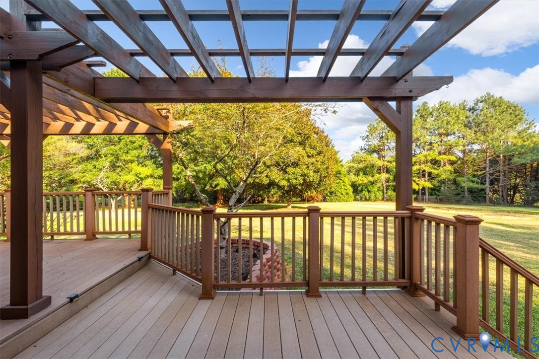 1437 Palmore Road Powhatan, VA 23139 - Photo 48 of 60 Expansive outdoor deck featuring a rich brown perg