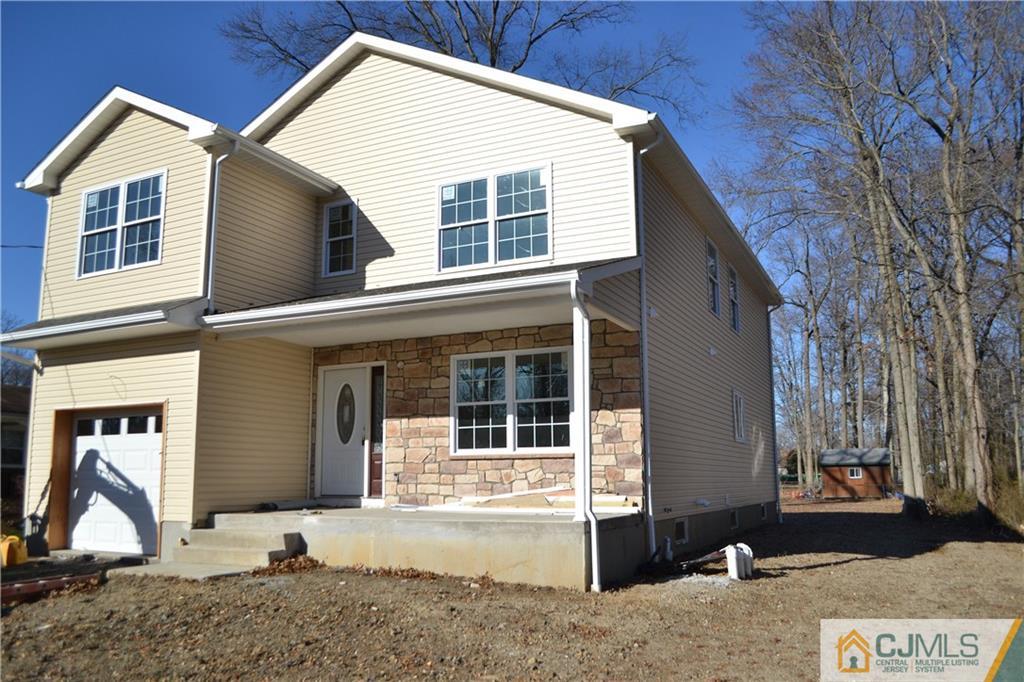 1633 Holly Road North Brunswick, NJ 08902 - Photo 1 of 5 a view of a house with a patio