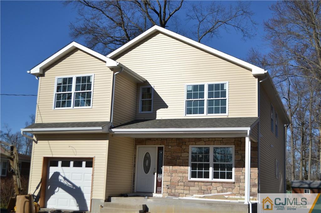 1633 Holly Road North Brunswick, NJ 08902 - Photo 2 of 5 a view of small house with large windows