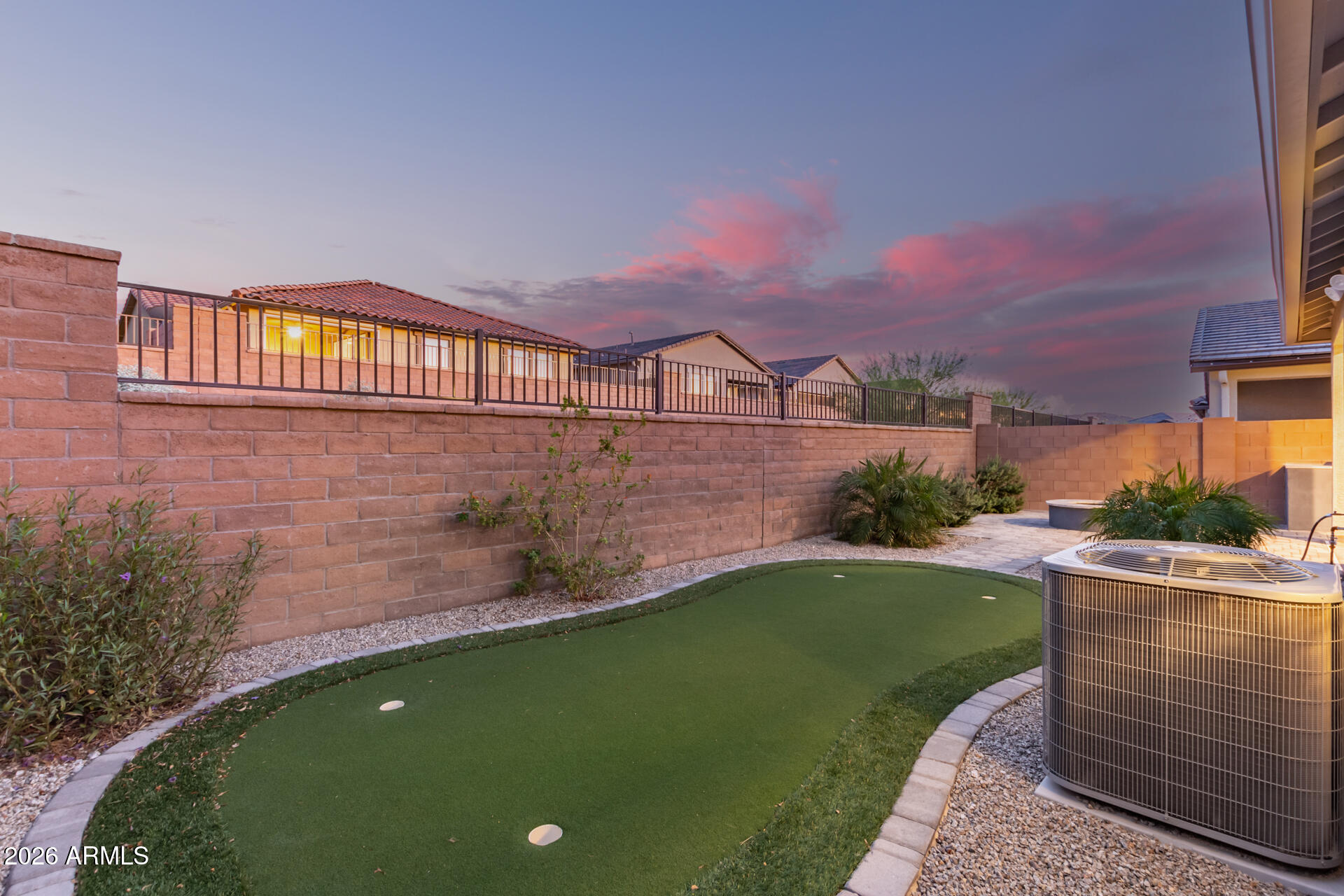 8835 South 166th Avenue Goodyear, AZ 85338 - Photo 12 of 23 a view of a house with a yard