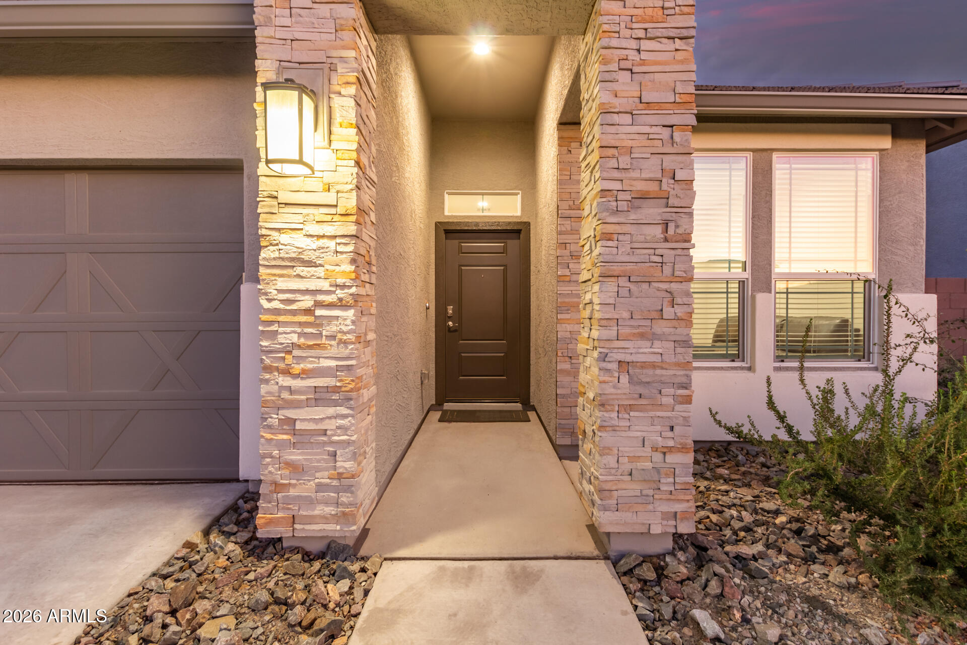 8835 South 166th Avenue Goodyear, AZ 85338 - Photo 15 of 23 a view of entryway with a front door