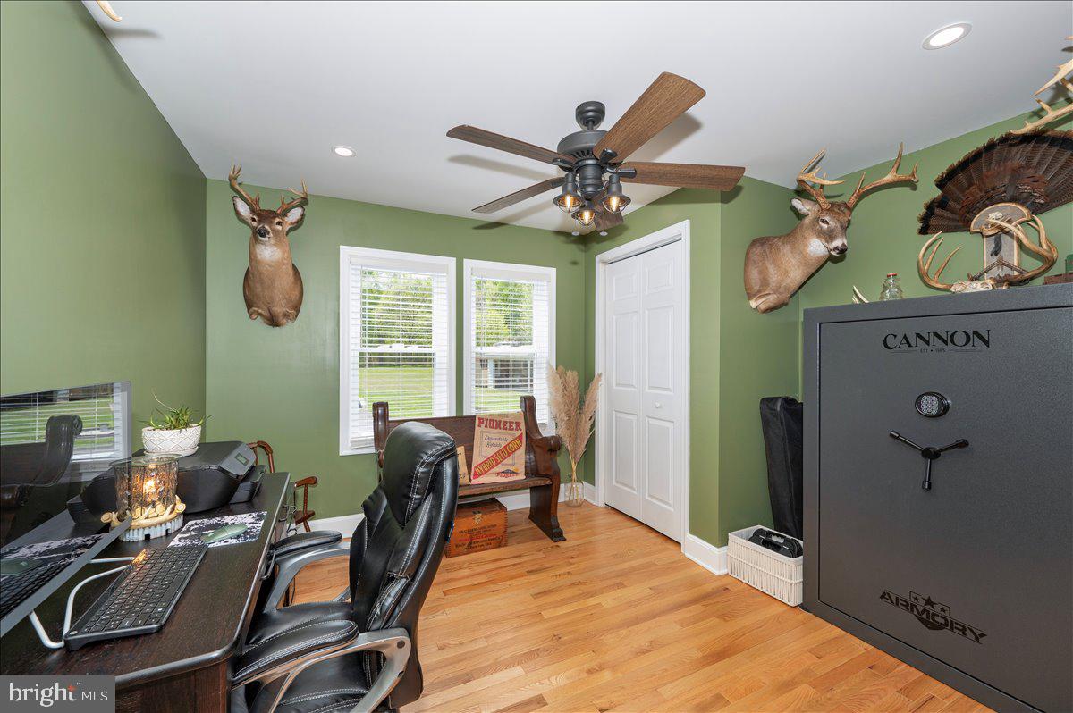 7117 Blue Mountain Road Thurmont, MD 21788 - Photo 25 of 80 a workspace with chandelier