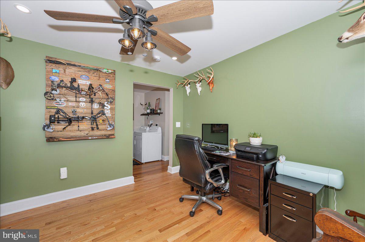 7117 Blue Mountain Road Thurmont, MD 21788 - Photo 27 of 80 a view of a workspace with furniture and a window