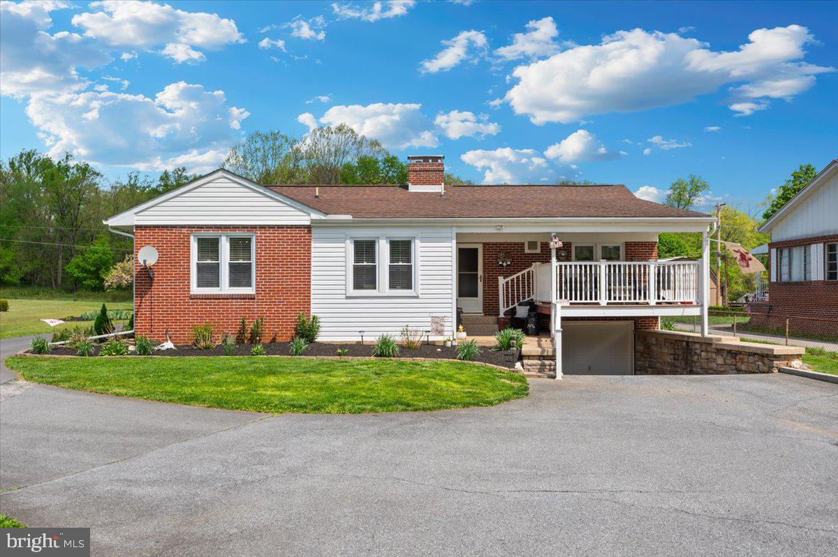 7117 Blue Mountain Road Thurmont, MD 21788 - Photo 40 of 80 a front view of a house with a yard