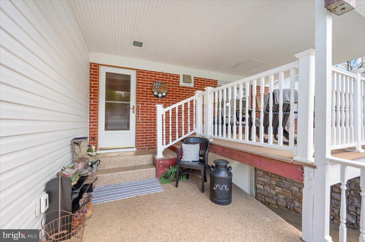 7117 Blue Mountain Road Thurmont, MD 21788 - Photo 42 of 80 a view of porch with seating space