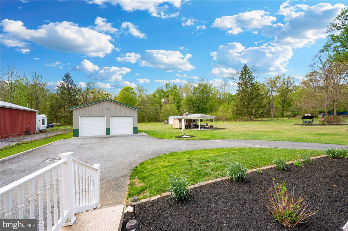 7117 Blue Mountain Road Thurmont, MD 21788 - Photo 45 of 80 a front view of a house with a yard