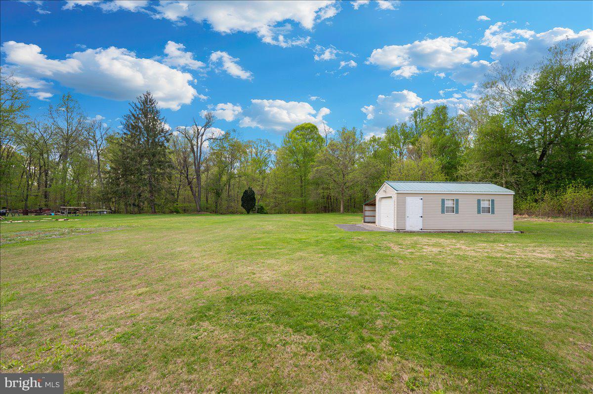 7117 Blue Mountain Road Thurmont, MD 21788 - Photo 54 of 80 a view of a big yard next to a house