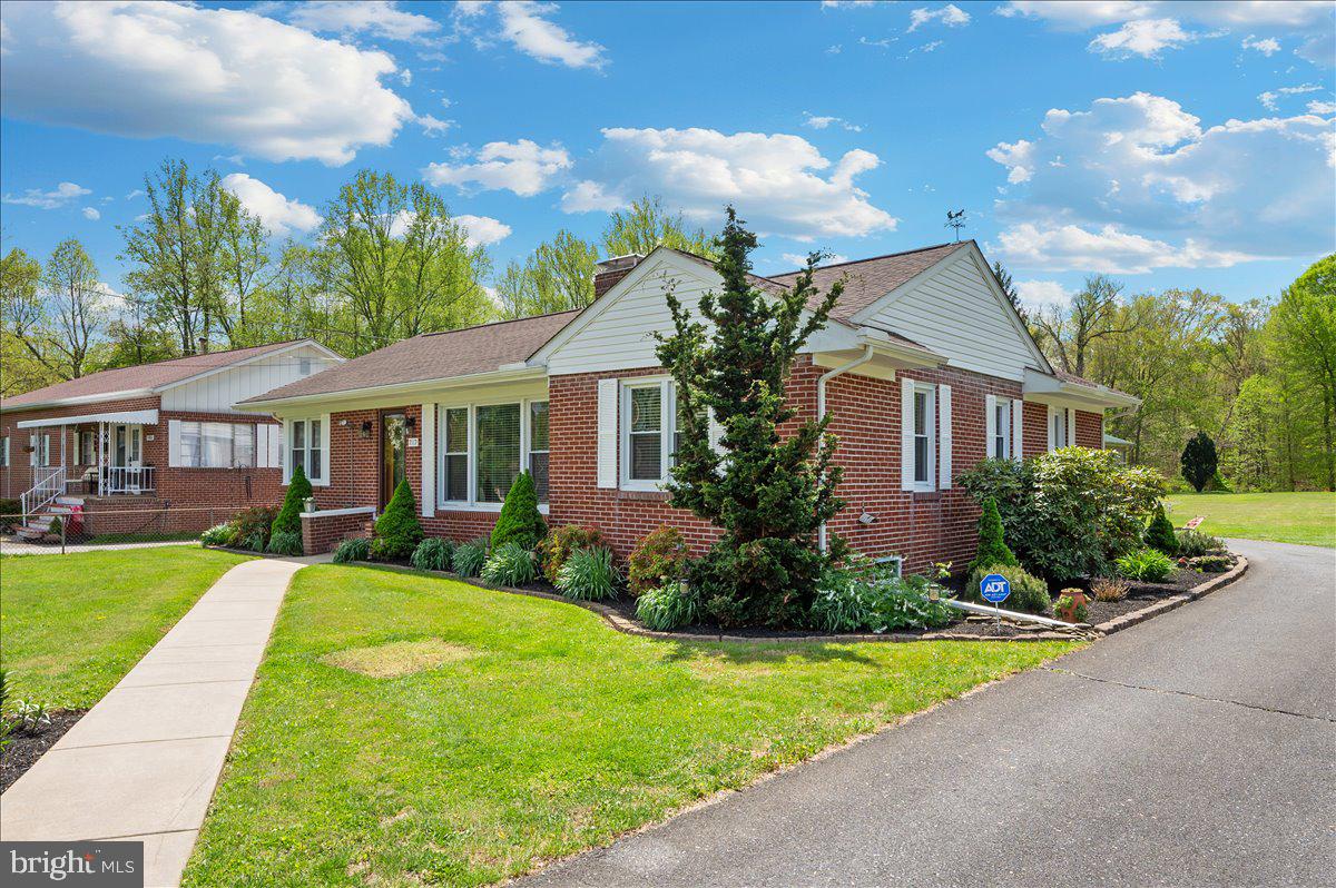 7117 Blue Mountain Road Thurmont, MD 21788 - Photo 70 of 80 a front view of a house with garden
