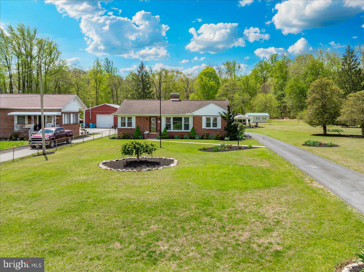 7117 Blue Mountain Road Thurmont, MD 21788 - Photo 77 of 80 an aerial view of a house with swimming pool and patio