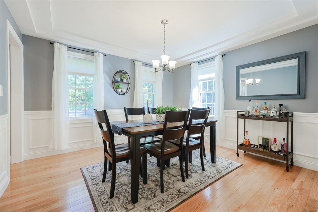 131 Pommogussett Road Rutland, MA 01543 - Photo 14 of 38 a view of a a dining room with furniture window and wooden floor
