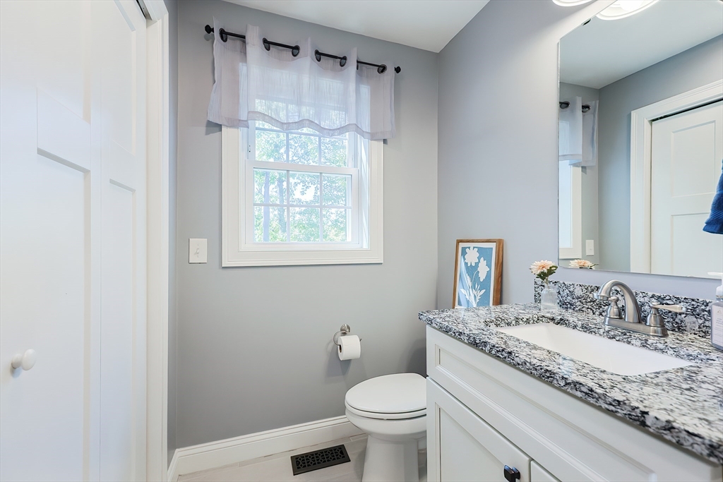 131 Pommogussett Road Rutland, MA 01543 - Photo 18 of 38 a bathroom with a granite countertop sink toilet and shower